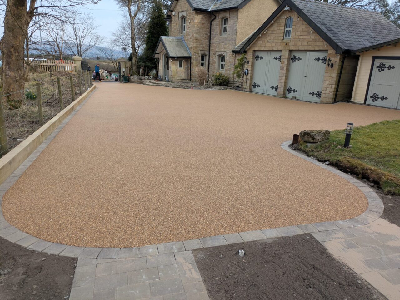 This is a photo of a new installed resin bound driveway in the Bolton area This is a photo of a new installed resin bound driveway in the Bolton area